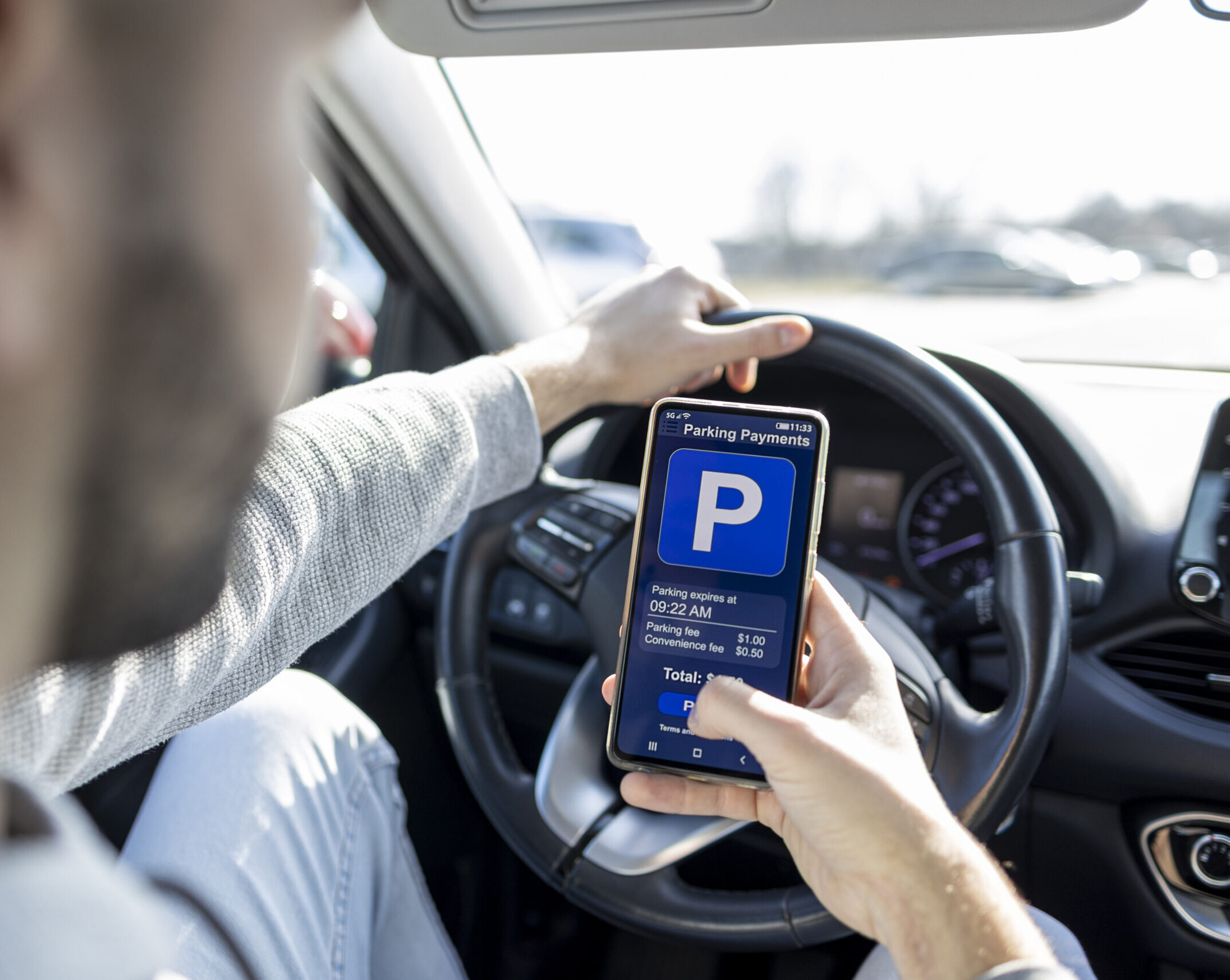 parking advisory services Driver using smartphone app to pay for parking